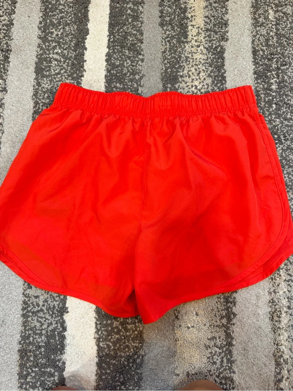 Nike Women’s Red Athletic Running Shorts with White Swoosh